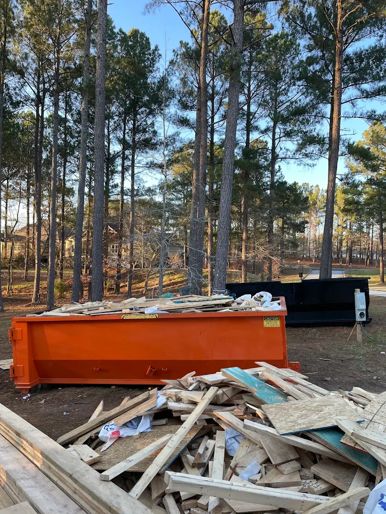 Proudfoot Rolloffs roll-off dumpster loaded with remodel debris in Greenwood, SC